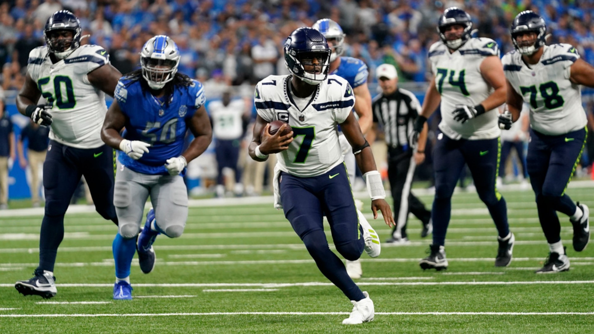 Geno Smith was in command from the opening kickoff, finishing with 328 passing yards and two touchdowns in the Seahawks 37-31 win.